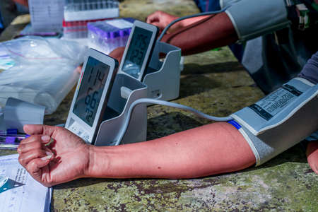 The blood pressure measurement at the hospital.の写真素材