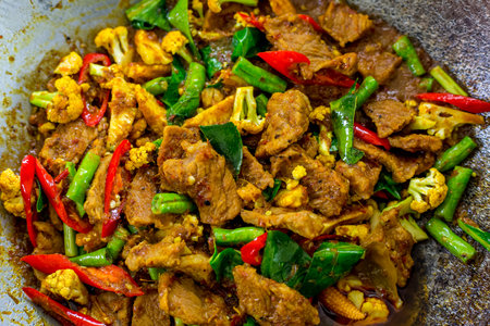 Stir-fried pork with vegetable in pan.の写真素材