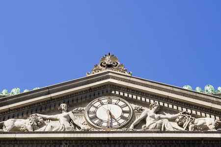 Old building attic with a street clock. Architectural details.の写真素材