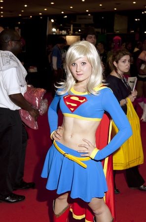 NEW YORK, NY - OCTOBER 14: Unidentified convention goer dressed up in costume of Supergirl attends 2011 New York Comic Con at the Jacob Javits Center on October 14, 2011 in New York City.のeditorial素材