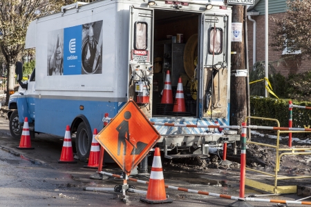 NEW YORK - NOVEMBER 8, 2012: Con Edison work to restore power to Manhattan Beach, Brooklyn, NY after Hurricane Sandy, November 8, 2012のeditorial素材