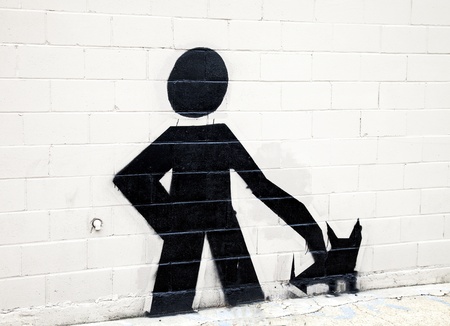 Dog walk graffiti on the wallの写真素材