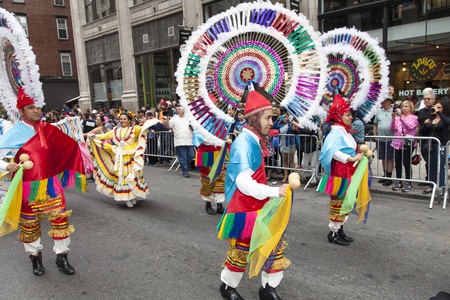 NEW YORK, NY - MAY 18: Members of Mazarte Dance Group dances on Broadway during 7th Dance Parade of...