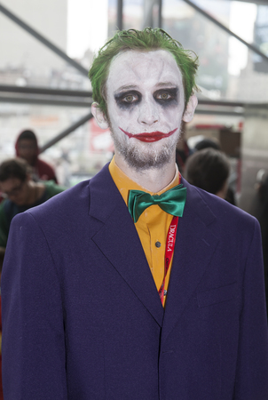 NEW YORK - October 13  Comic Con attendee poses in the costume of Joker during Comic Con 2013 at The Jacob K  Javits Convention Center on October 13, 2013 in New York City のeditorial素材