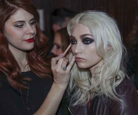 New York, NY, USA - February 06, 2014  A model prepairs backstage  at Jay Godfrey Presentation during Mercedes-Benz Fashion Week Fall 2014 at The Hub at The Hudson Hotelのeditorial素材