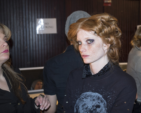 New York, NY, USA - FEBRUARY 06, 2014  A model prepairs backstage  at Jay Godfrey Presentation during Mercedes-Benz Fashion Week Fall 2014 at The Hub at The Hudson Hotelのeditorial素材
