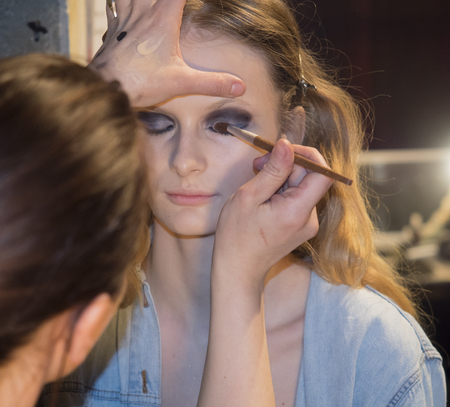 New York, NY, USA - February 06, 2014  A model prepares backstage  at Jay Godfrey Presentation during Mercedes-Benz Fashion Week Fall 2014 at The Hub at The Hudson Hotelのeditorial素材