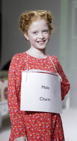 New York, NY, USA - October 19, 2014: A model walks the runway rehearsal during the Charm collection preview at petitePARADE / Kids Fashion Week at Bathhouse Studios, Manhattanのeditorial素材