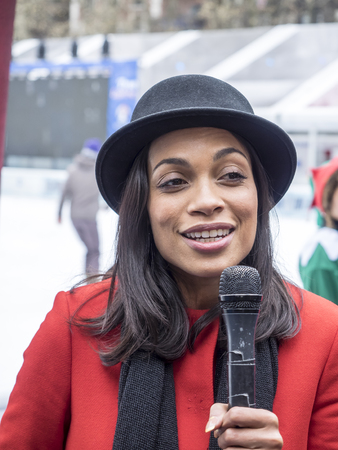 New York, NY, USA - December 2, 2014:  Actress Rosario Dawson kicks off Operation \'Give With Gusto\' in New York with NESCAFE Dolce Gusto and 100 Holiday Elves at Bryant Park, Manhattanのeditorial素材