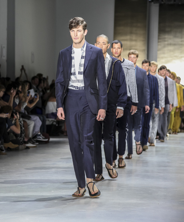 New York, NY, USA - July 16, 2015: Models walk runway at the Perry Ellis Runway show during New York Fashion Week: Men's S/S 2016 at Skylight Clarkson Sq, Manhattanのeditorial素材
