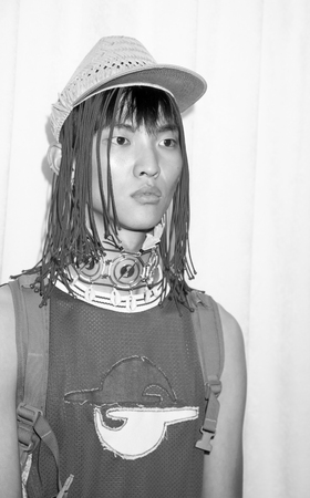 New York, NY, USA - July 15, 2015: A model poses on backstage at the Gypsy Sport 'The Jade Helm Collection' presentation by Rio Uribe during New York Fashion Week: Men's S/S 2016 at Skylight Clarkson Sq, Manhattanのeditorial素材