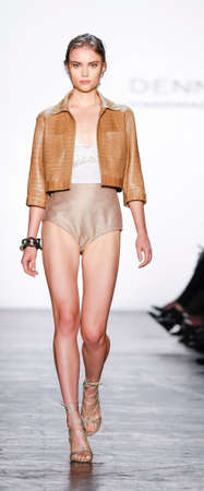 New York, NY, USA - September 15, 2015: A model walks the runway at Dennis Basso runway show during...
