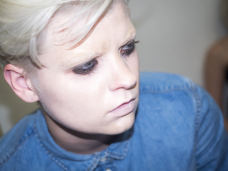 New York, NY, USA - September 14, 2015: A model prepares backstage for Victor de Souza SS 2016 Ready to Wear Collection during New York Fashion Week at 4 West 43rd Street, Main Ballroom, Manhattan.のeditorial素材