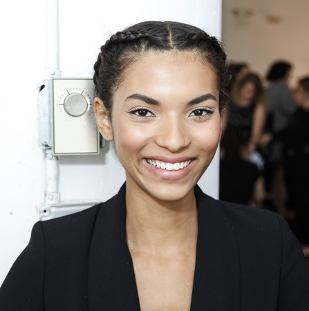 New York, NY, USA - October 8, 2015: A model prepares backstage for Marchesa Fall/Winter 2016 Bridal Presentation at Canoe Studio, Manhattanのeditorial素材
