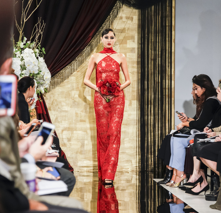 New York, NY, USA - October 8, 2015: A model walks runway for Theia Fall 2016 Bridal Collection at Theia Showroom during New York Bridal week, Manhattanのeditorial素材