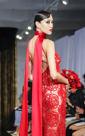 New York, NY, USA - October 8, 2015: A model walks runway for Theia Fall 2016 Bridal Collection at Theia Showroom during New York Bridal week, Manhattanのeditorial素材