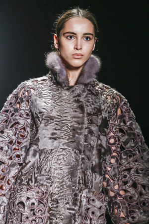 New York, NY, USA - February 16, 2016: A model walks the runway at Dennis Basso runway show during...