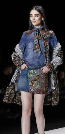 New York, NY, USA - February 11, 2016: A model walks the runway at the Desigual runway show during...