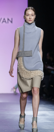 New York, NY, USA - February 13, 2016: A model walks runway at the Son Jung Wan runway show during...