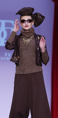 New York, NY, USA - February 14, 2016: A model walks the runway at the David Tupaz runway show during of Fall/Winter 2016 New York STYLE Fashion Week at Gotham Hall, Manhattan.のeditorial素材