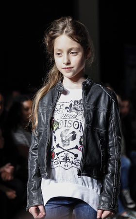 New York, NY, USA - March 12, 2016: Models walk the runway for DIESEL KID collection at petitePARADE / Kids Fashion Week New York at Spring Studios, Manhattan.のeditorial素材