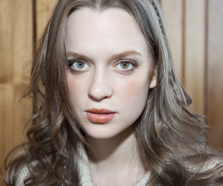 New York, NY, USA - April 15, 2016: A model prepares backstage for RIVINI & Alyne Spring 2017 Bridal Collection at The Standart, High Line during New York International Bridal week, Manhattanのeditorial素材