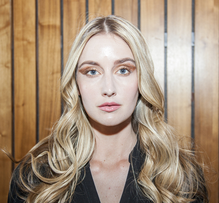 New York, NY, USA - April 15, 2016: A model prepares backstage for RIVINI & Alyne Spring 2017 Bridal Collection at The Standart, High Line during New York International Bridal week, Manhattanのeditorial素材