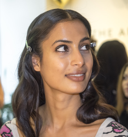 New York, NY, USA - September 10, 2016: A model prepares backstage for the Rebecca Minkoff Fall/Winter 2016 runway show during New York Fashion Week SS 2017 at The Magnum Store, Manhattanのeditorial素材
