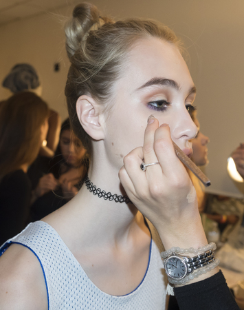 New York, NY, USA - September 13, 2016: A model prepares backstage for the Monique Lhuillier Spring/Summer 2017 runway show during New York Fashion Week SS 2017 at The IAC building, Manhattanのeditorial素材