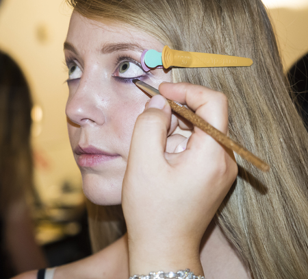 New York, NY, USA - September 13, 2016: A model prepares backstage for the Monique Lhuillier Spring/Summer 2017 runway show during New York Fashion Week SS 2017 at The IAC building, Manhattanのeditorial素材