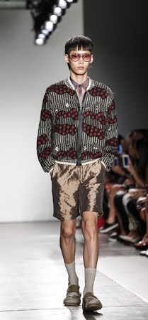 New York, NY, USA - September 11, 2016: Model walks runway for the Custo Barcelona women's & men's Spring/Summer 2017 runway show during New York Fashion Week SS 2017 at Pier 59 Studios at Chelsea Piers, Manhattanのeditorial素材