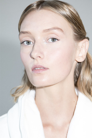 New York, NY, USA - October 5, 2016: A model prepares backstage for Marchesa Fall/Winter 2017 Bridal Presentation at Canoe Studio, Manhattanのeditorial素材