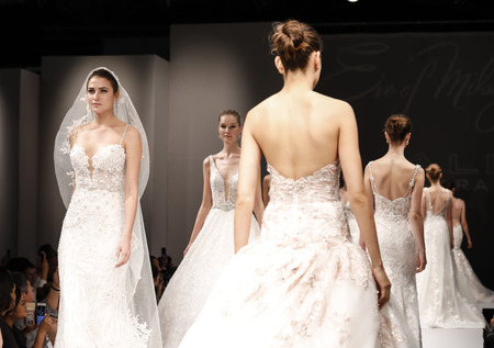 New York, NY, USA - October 8, 2016: Models walk runway for Eve of Milady / Amalia Carrara Spring  2017 Bridal Collection during New York International Bridal Week at the Fashion Theater, Pier 94, Manhattanのeditorial素材