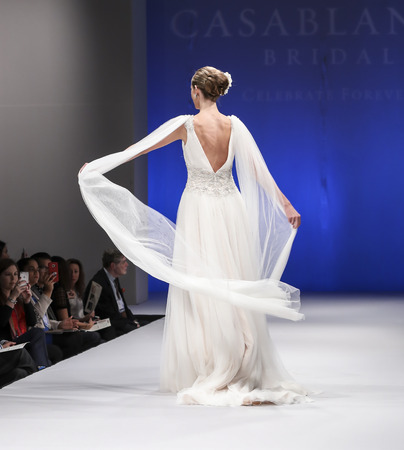 New York, NY, USA - October 8, 2016: A model walks runway for Casablanca Bridal Spring 2017 Collection during New York International Bridal Week at the Fashion Theater, Pier 94, Manhattanのeditorial素材