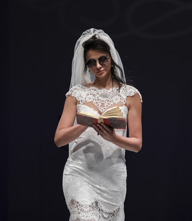 New York, NY, USA - October 8, 2016: A model walks runway for Olvi's by Olga Yermoloff Spring 2017 Collection 'Alchemy' during New York International Bridal Week at the Fashion Theater, Pier 94, Manhattanのeditorial素材