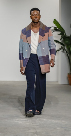 New York, NY, USA - February 1, 2017: A model walks runway for Palmiers du Malrunway show during NY Fashion Week: Men's at Skylight Clarkson Sq., North, Manhattanのeditorial素材