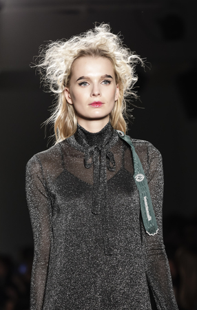 New York, NY, USA - February 13, 2017: A model walks runway for the Katty Xiomara Fall/Winter 2017 runway show during New York Fashion Week at Pier 59 Studios at Chelsea Piers, Manhattanのeditorial素材