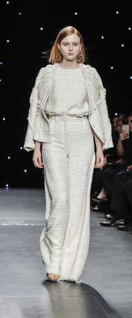 New York, NY, USA - February 10, 2017: A model walks runway for Oday Shakar FW17 collection runway show during New York Fashion Week at Pier 59 Studios, Manhattanのeditorial素材