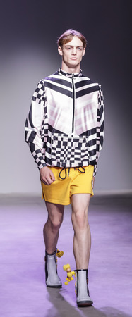 New York, NY, USA - July 11,2017: Amodel walks the runway for N-p-Elliott Runway Show during New York Fashion Week: Men's at Skylight Clarkson Square, NYGのeditorial素材