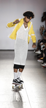 New York, NY, USA - September 12, 2017: A model walks runway for the Calvin Luo Spring/Summer 2018 runway show during New York Fashion Week at Whitney Museum Of American Art, Manhattanのeditorial素材