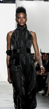 New York, NY, USA - September 11, 2017: A model walks runway for the Hakan Akkaya Spring/Summer 2018 runway show during New York Fashion Week at Skylight Clarkson Sq., Manhattanのeditorial素材