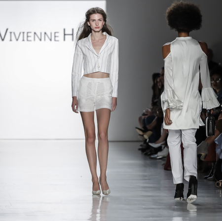 New York, NY, USA - September 10, 2017: A model walks runway for the Vivienne Hu Spring/Summer 2018 runway show during New York Fashion Week at Skylight Clarkson Sq., Manhattanのeditorial素材