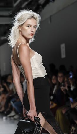 New York, NY, USA - September 10, 2017: A model walks runway for the Vivienne Hu Spring/Summer 2018 runway show during New York Fashion Week at Skylight Clarkson Sq., Manhattanのeditorial素材