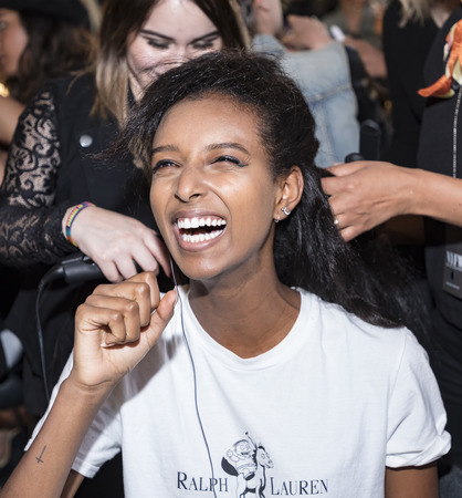 New York, NY, USA - September 6, 2017: A model prepares backstage for the Greta Constantine Spring/Summer 2018 Presentation during New York Fashion Week at Pier 59 Studios at Chelsea Piers., Manhattanのeditorial素材