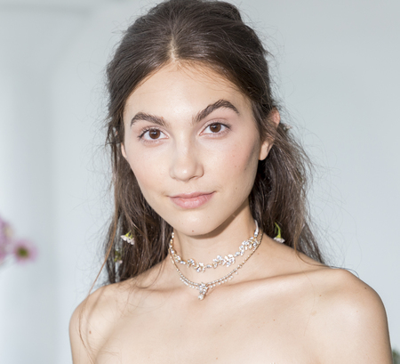 New York, NY, USA - October 5, 2017: A model shows out a dress by Georgina Chapman and Keren Craig for Marchesa and Notte Fall/Winter 2018 Bridal Presentation during New York Bridal Week at Canoe Studio, Manhattanのeditorial素材