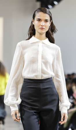 New York, NY, USA - February 8, 2018: A model walks runway for the Noon by Noor Fall/Winter 2018 runway show during New York Fashion Week at Spring Studios, Manhattanのeditorial素材