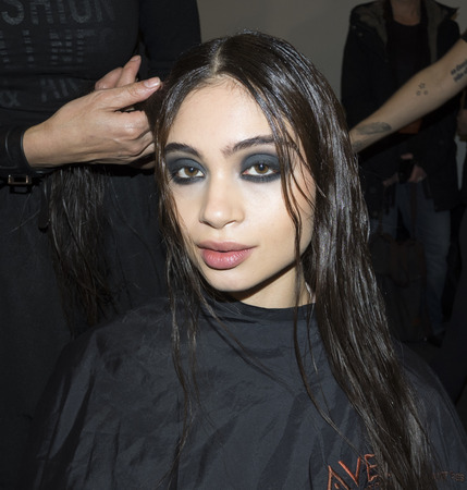 New York, NY, USA - Febbruary 14, 2018: A model prepares backstage for Leanne Marshall Fall/Winter 2018 runway show during New York Fashion Week at Spring Studios, Manhattanのeditorial素材
