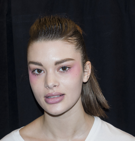 New York, NY, USA - February 10, 2018: A model prepares backstage for Son Jung Wan Fall/Winter 2018 runway show during NY Fashion Week at Spring Studios, Manhattanのeditorial素材