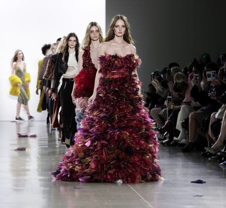 New York, NY, USA - February 13, 2018: Models walk runway for Vivienne Hu Fall/Winter 2018 runway show during NY Fashion Wweek at Spring Studios, Manhattanのeditorial素材