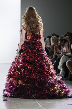 New York, NY, USA - February 13, 2018: A model walks runway for Vivienne Hu Fall/Winter 2018 runway show during NY Fashion Wweek at Spring Studios, Manhattanのeditorial素材